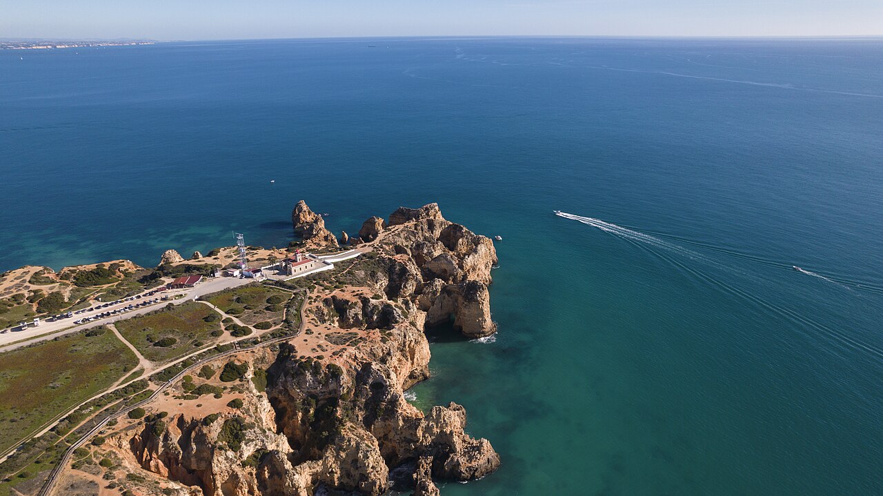 Golden cliffs and clear water at Ponta da Piedade in the Algarve